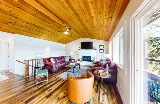 Waterfront home on Spokane River with dock, decks & 2 complete living spaces