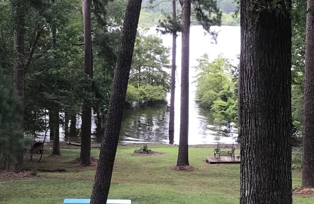 Waterfront home on a beautiful wooded, private1 acre lot on Sam Rayburn.