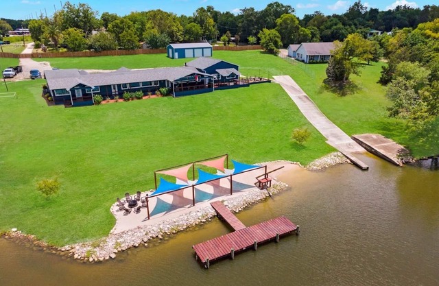 Waterfront Home with Boat Launch and Dock, Pool & basketball/pickleball court mini golf, playground
