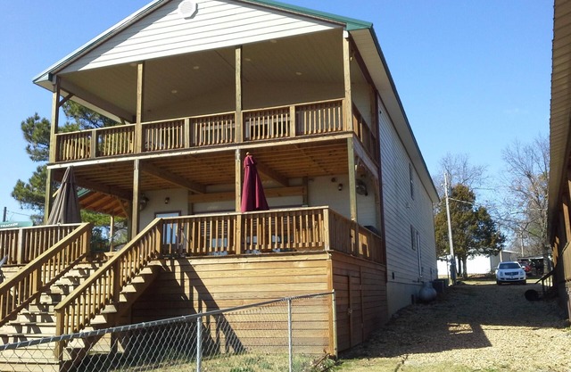 Waterfront Lake Home at Duchess Creek Estates with boat dock on Lake Eufaula, OK