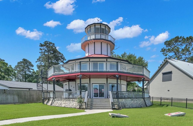 Waterfront Lighthouse with Large Dock for a Great Family Getaway