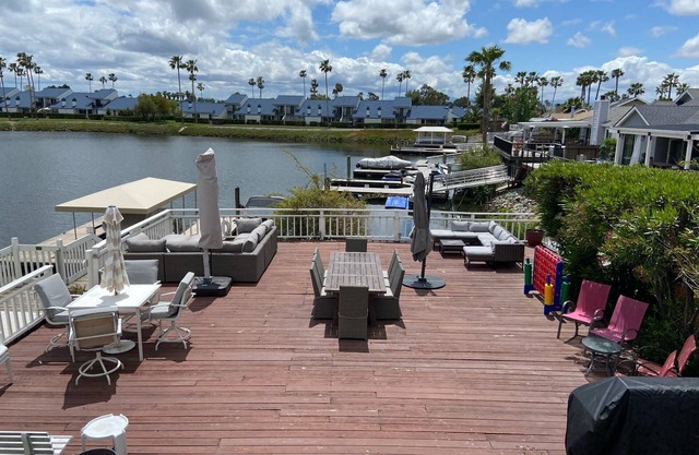 Waterfront modern home Sleeps 6 near Marina w/Hot Tub, Large Deck, and EVCharge