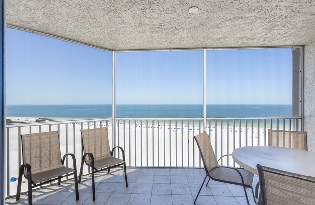 Waterfront penthouse with beach views, pool, hot tub, & tennis court