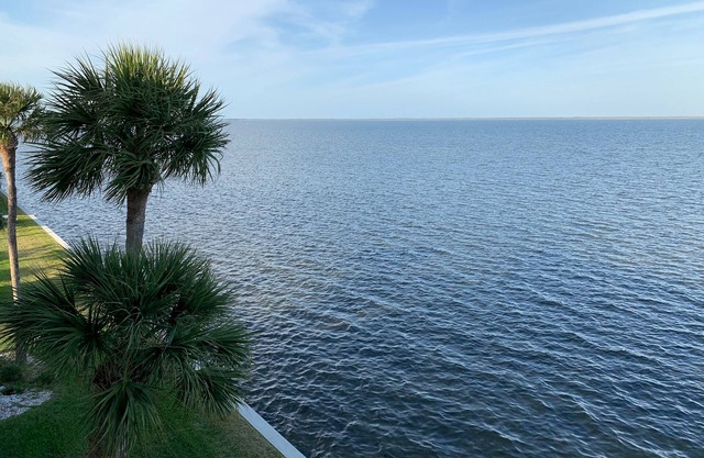 Waterfront Top Floor Condo with Perfect Views of Dolphins and SpaceX Launches