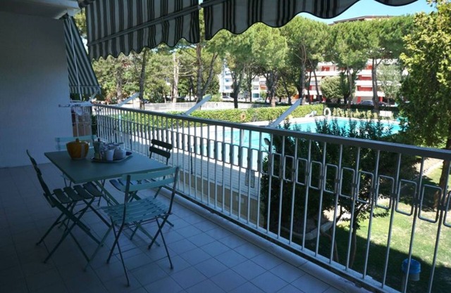 Welcoming flat with charming pool view terrace