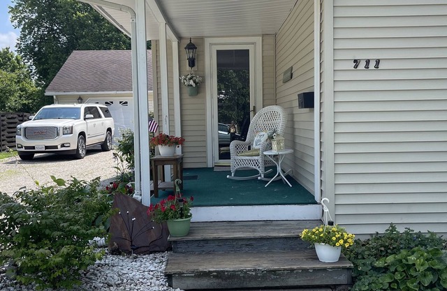 Welcoming hometown retreat with pool, hot tub and fenced in yard.