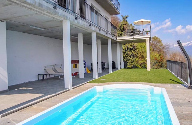 Well maintained 4 room apartment with dream view and solar heated pool