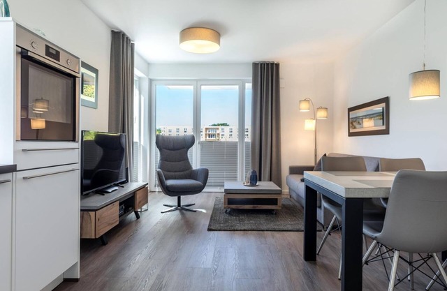 Wheelchair-friendly 2-room apartment with terrace and sauna area in the house -