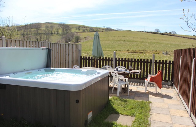 Whole house sleeps 5, private garden with hot-tub, pet friendly.