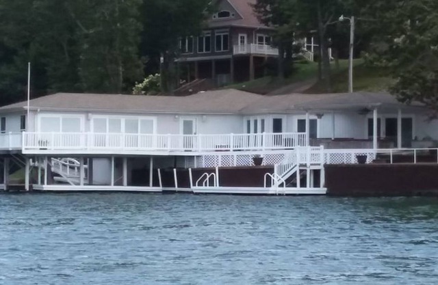 Wilson Lake House. Boatlift underneath living room.
