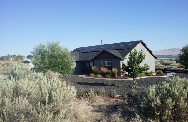 Wine tasting from this eco-friendly home with stunning views.