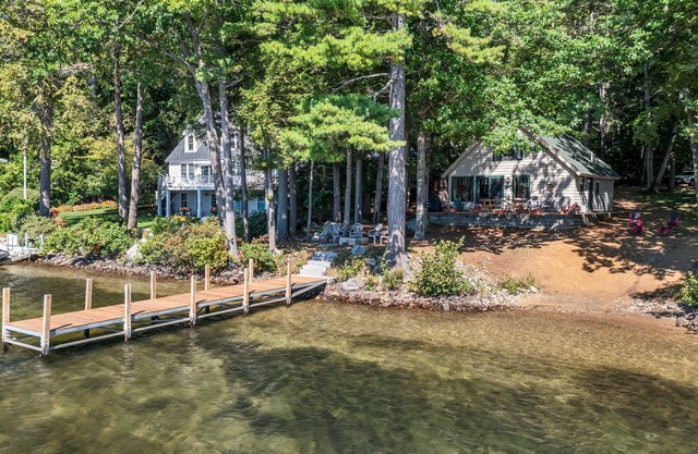 Winnipesaukee Waterfront Chalet with Sandy Beach Private Dock and Fire Pit