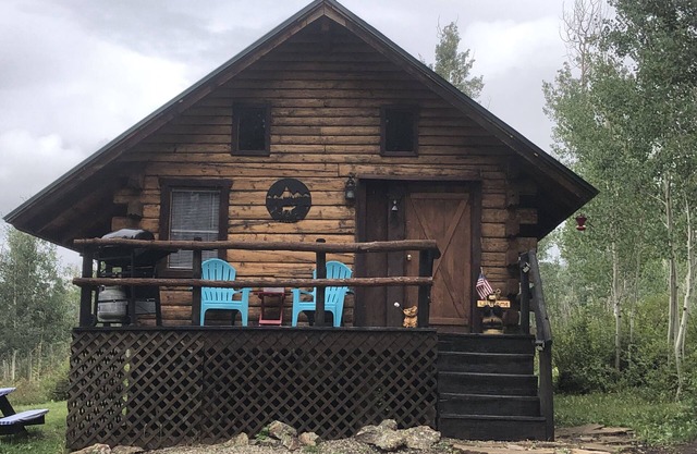 Wolf Den Cabin is cozy and rustic that overlooks the beautiful aspens trees.