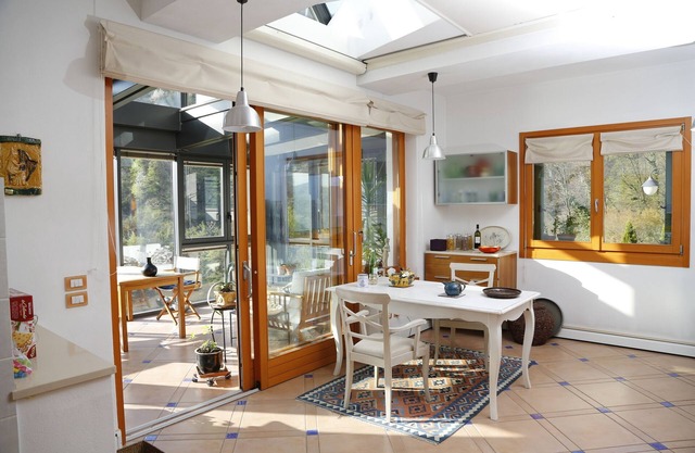 Wonderful living in villa in the garden. View of mountains, lake, many attractions.