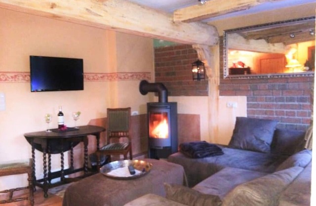 Wood-burning stove in romantic piano apartment, Hechthausen