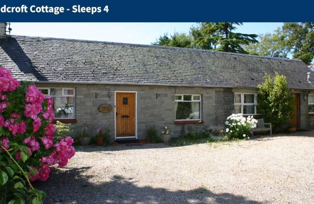 Woodcroft Holiday Cottage in Ayr is set within the lawned, west-facing garden