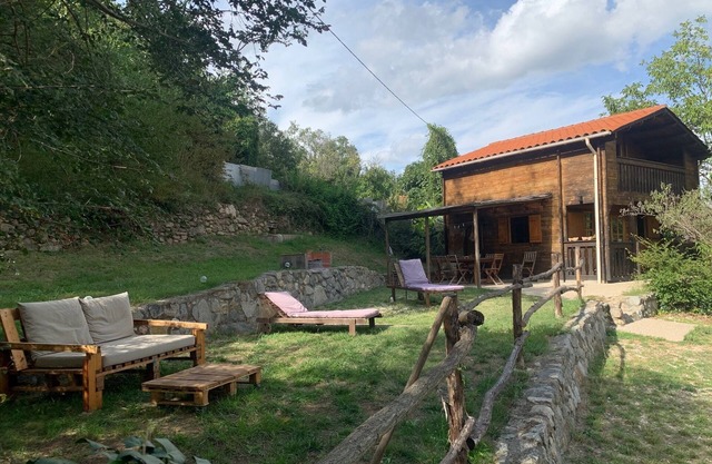 Wooden chalet in a verdant environment at the foot of the Mount Canigou
