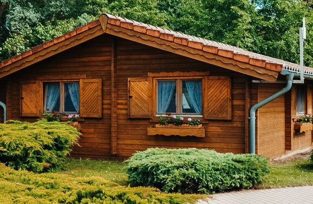 Wooden house directly on the lake