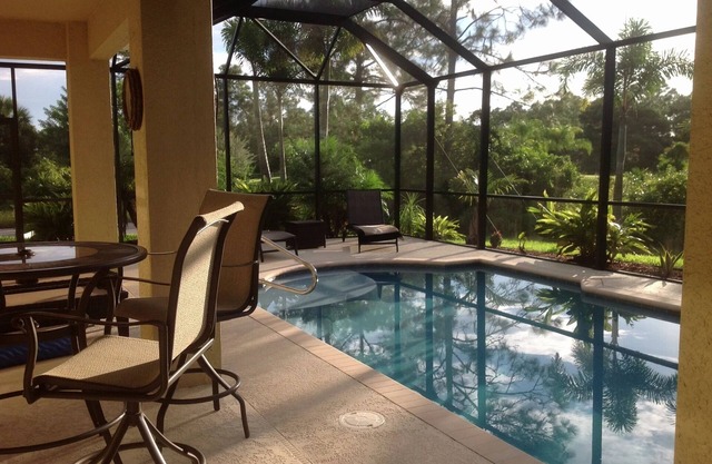 WOW! Stunning 3-Bedroom HEATED Pool Home: Your Private Oasis Awaits!