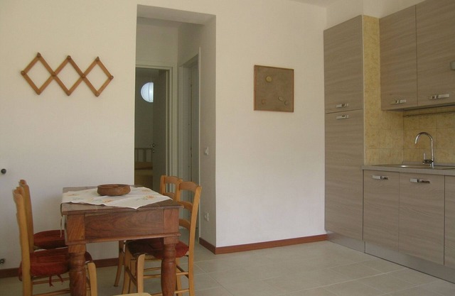 yellow apartment l'0leandra immersed in the olive grove