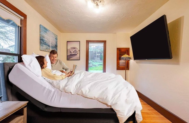 You deserve the best! Adjustable king bed with premium mattress, massage chair