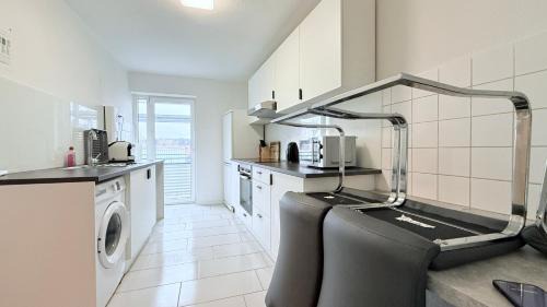 Zentrale Apartments in Neumünster direkt an der Stadthalle mit Küche & WLAN
