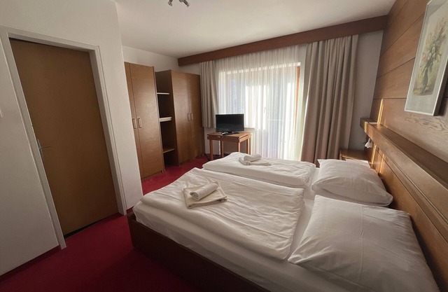 Zimmer 14/2bett mit Balkon - Pension Alpina