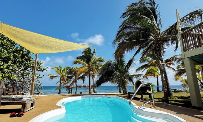 West End House | #1 on island, 2-bdm large and cozy, pool, sandy beach w/cabana, hammocks & more