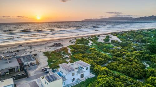 Oceano House | 2 Oceanfront Homes w Rooftop Deck Views Steps to the Sand