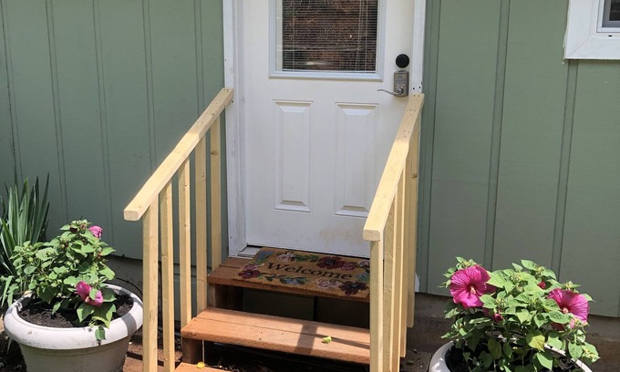 Veneta Apartment | A waterfall, bountiful gardens and the sound of birds, fenced and pet friendly!