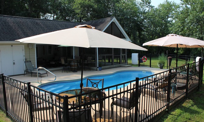 Lewes House | AMAZING Coastal Retreat along Love Creek w/private pool, hot tub and pool house