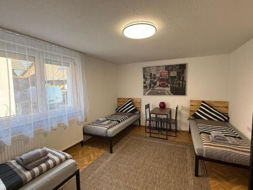 Kappel-Grafenhausen House | ARCOS Apartment - Geräumige 3-Zimmer-Wohnung mit 8 Einzelbetten - Perfekt für Familien, Gruppen oder Monteure
