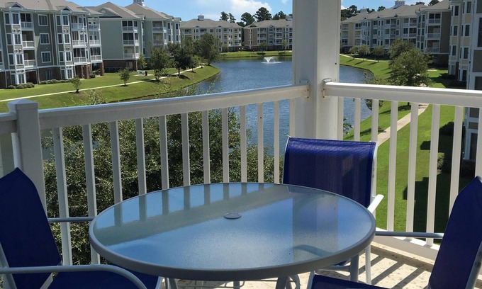Central Myrtle Beach Condo | Beautiful, Clean condo, new furniture beds carpet TVs. Lake view, private Wifi