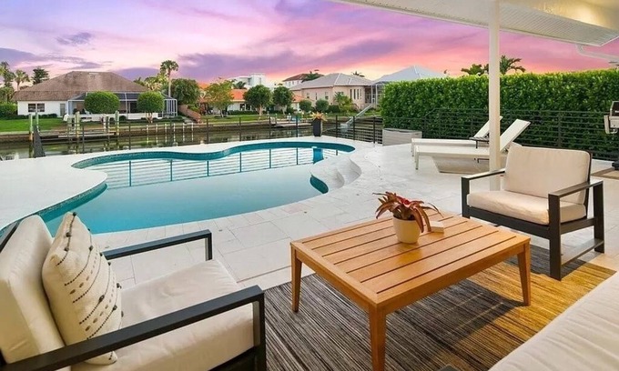 Connors House | Beautiful home on canal w/pool, walking distance to Vanderbilt Beach