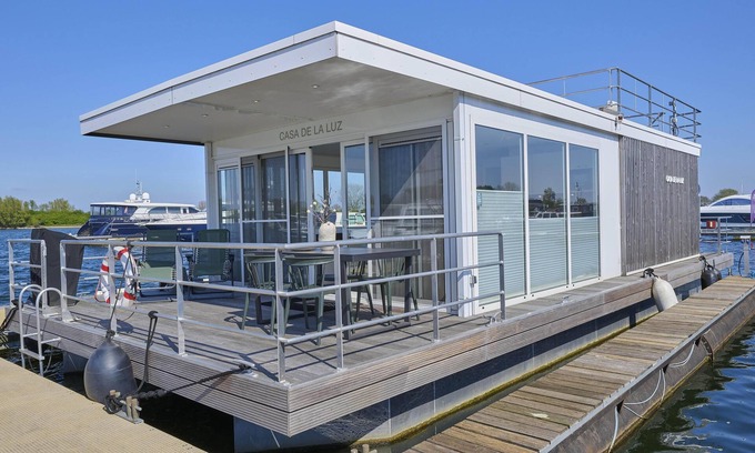 Kerkdriel Boat Rental | Beautiful houseboat in harbour of Kerkdriel