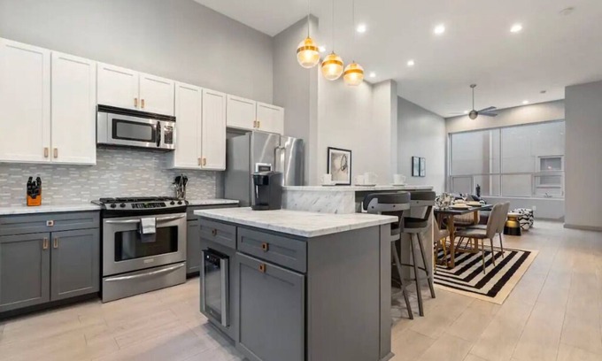 Bryan Place House | Breathtaking 4 Story Townhome w/Skyline Views, Space for All!