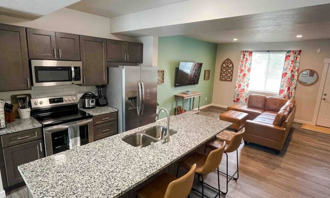 Spokane House | Central 3/2, garage, private yard, walk to arena, EV charger