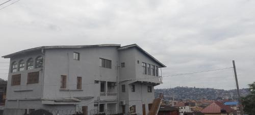 Freetown House | Comfort Zone Furnished Apartments