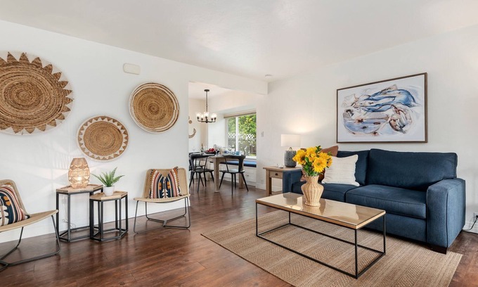 East Beach House | Comfortable Condo Just a Half Block to East Beach!