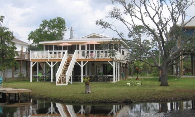 Shoreline Park Cottage | Cottage Charm - Peaceful Setting - Beautiful Bayou View & Retreat!