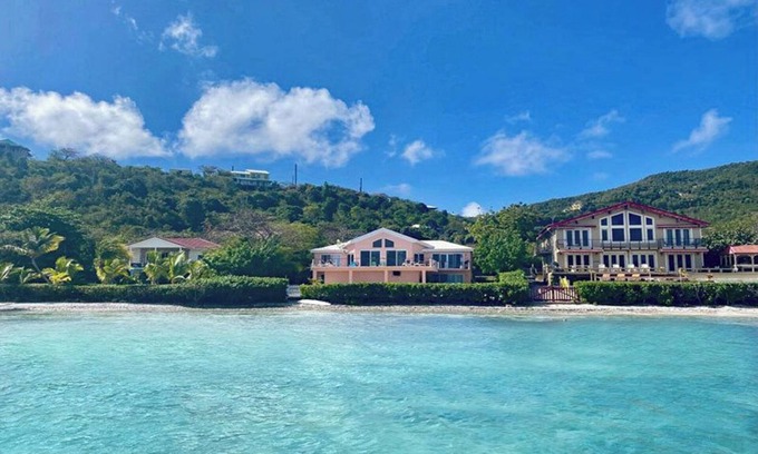 Johnson Bay Villa | Discover the Rainbow Beach House – your ultimate beachfront getaway in stunning Coral Bay! Experience the perfect blend of comfort and relaxation in this idyllic paradise. Book your escape today!