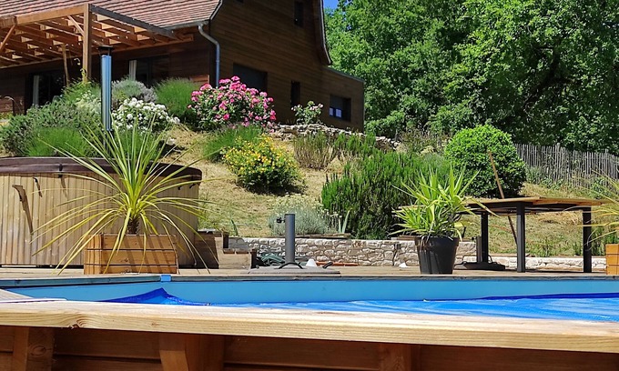 Betaille House | Dordogne Valley Lot timber-frame house set in greenery.