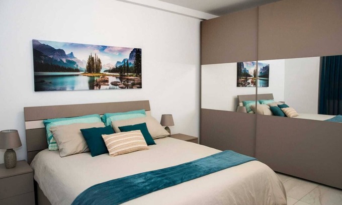 Msida Apartment | East Garden Residences, modern, central condo with 2 large balconies.