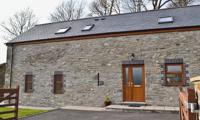 Glandyfi Cottage | Enjoy a holiday here at any time of year in this cosy converted cottage.