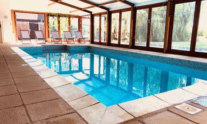 Westmarsh Other | Family Retreat in Kent. All-year pool. Sleeps 12 + 2. 6 bedrooms, 4 bathrooms.