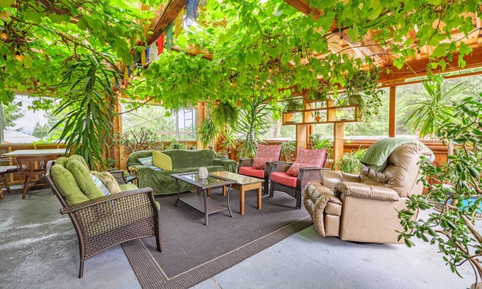 Ucluelet House | Grapevine Guest House. A west coast home featuring a 25 year old grapevine.