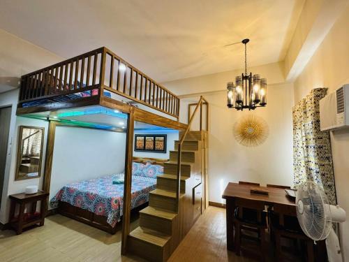 Trece Martires Apartment | Happy Stays C - 300mbps - 65"TV NetFlix, Disney - Loft