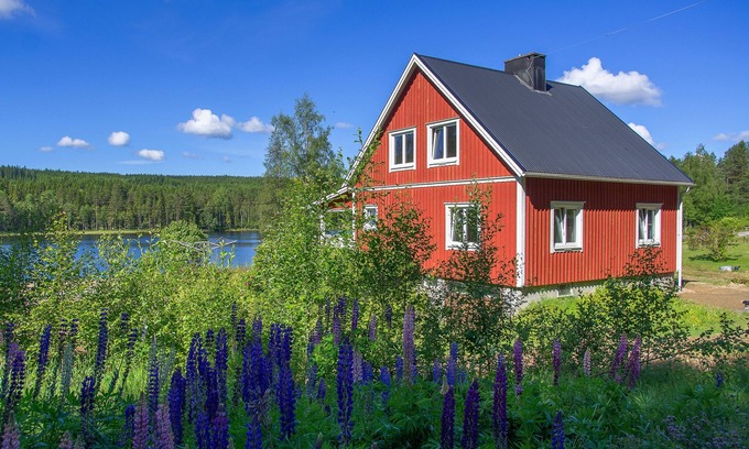 Axland House | Idyllic sunny lakeside location with only 20 m to the private jetty and boat.