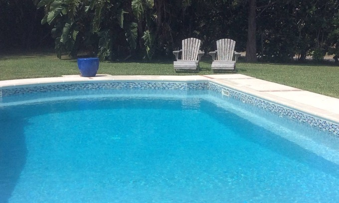 Smith's Apartment | Las Brisas apartment with pool and walk to beach + EV chargers