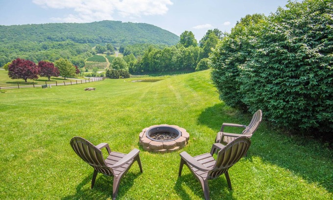 West Jefferson Cabin | Log Cabin in West Jefferson - Fishing Pong + Hot Tub + Fire Pit + Mountain Views